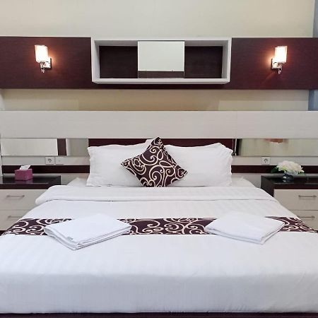 Hotel Pilar Mosa Muarawahau Buitenkant foto