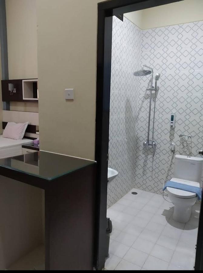 Hotel Pilar Mosa Muarawahau Buitenkant foto