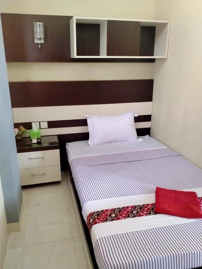 Hotel Pilar Mosa Muarawahau Buitenkant foto