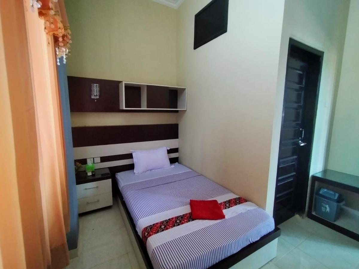Hotel Pilar Mosa Muarawahau Buitenkant foto