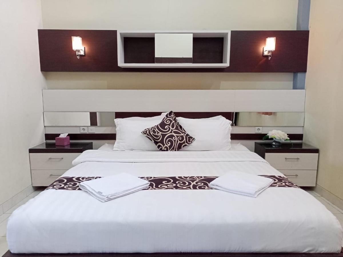 Hotel Pilar Mosa Muarawahau Buitenkant foto
