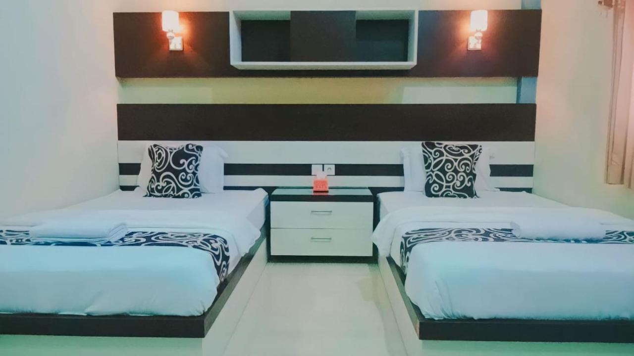 Hotel Pilar Mosa Muarawahau Buitenkant foto